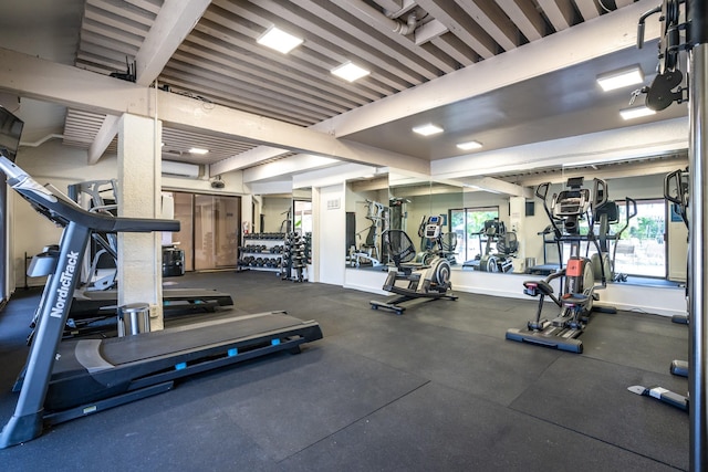 exercise room featuring a wall mounted air conditioner