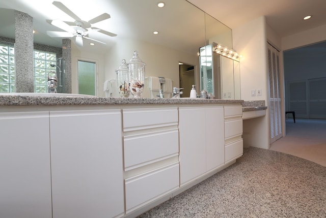 bathroom featuring a shower, a ceiling fan, vanity, and recessed lighting