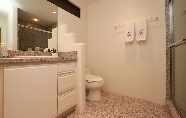 full bath featuring toilet, a shower stall, recessed lighting, and vanity