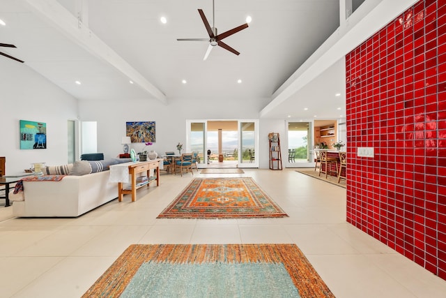 interior space with beamed ceiling and ceiling fan