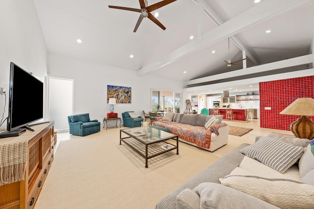 living room with beamed ceiling, high vaulted ceiling, and ceiling fan