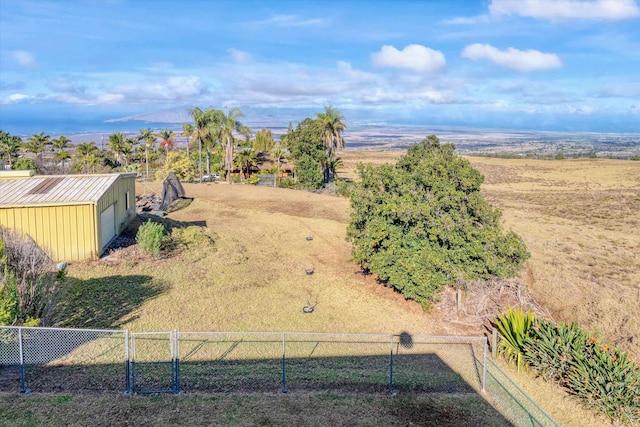 birds eye view of property featuring a rural view