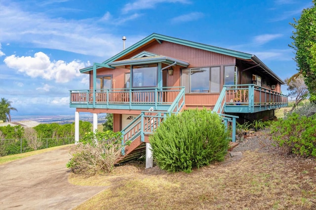 view of front of property with a sunroom