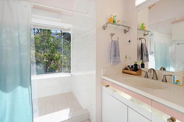 bathroom with a shower with curtain and vanity