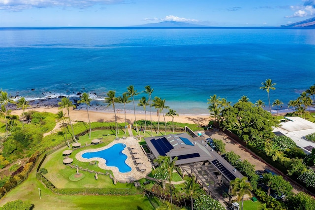 drone / aerial view featuring a view of the beach and a water view