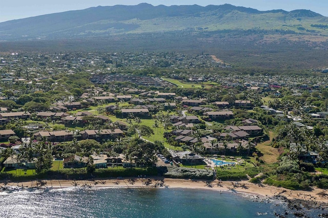 bird's eye view with a water and mountain view