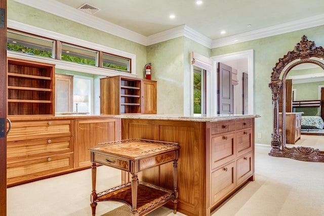 kitchen featuring light colored carpet and ornamental molding