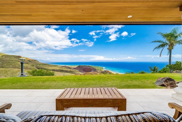 view of patio featuring a water view