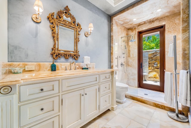 bathroom featuring vanity, toilet, and walk in shower