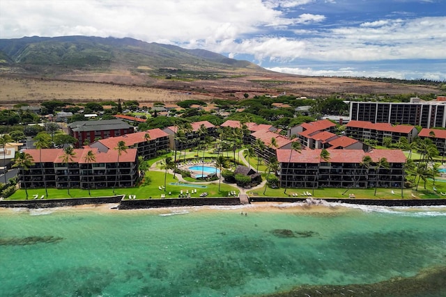 bird's eye view with a water and mountain view