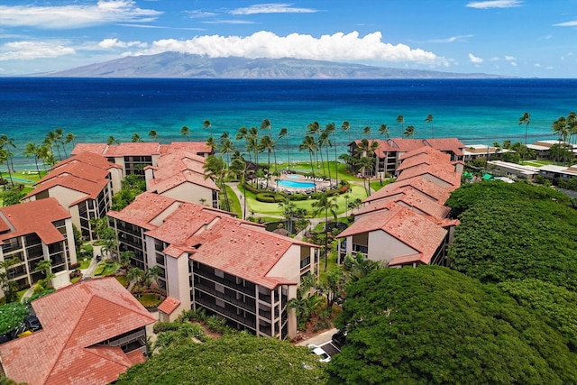 bird's eye view with a water and mountain view