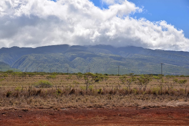 mountain view featuring a rural view