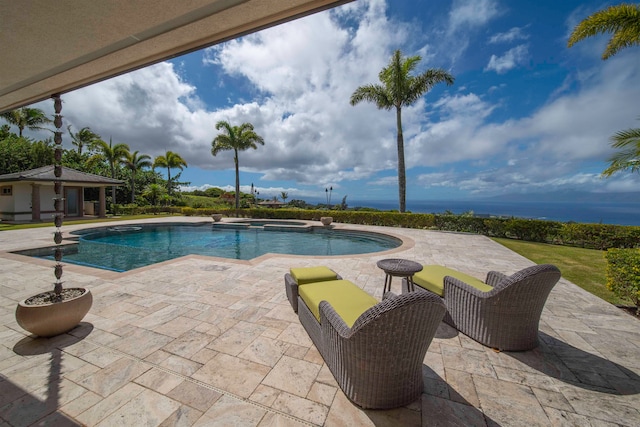 view of pool with an in ground hot tub and a patio area