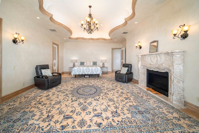 bedroom featuring a fireplace and wood-type flooring