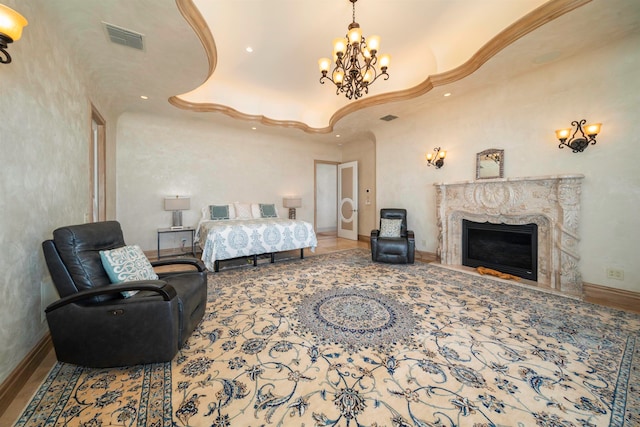 bedroom with hardwood / wood-style flooring and a premium fireplace