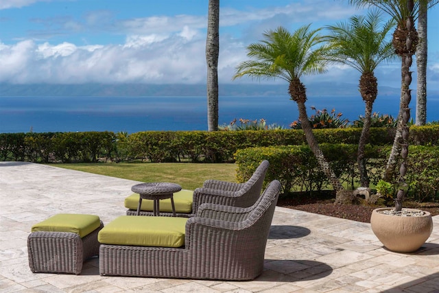 view of patio / terrace featuring a water view