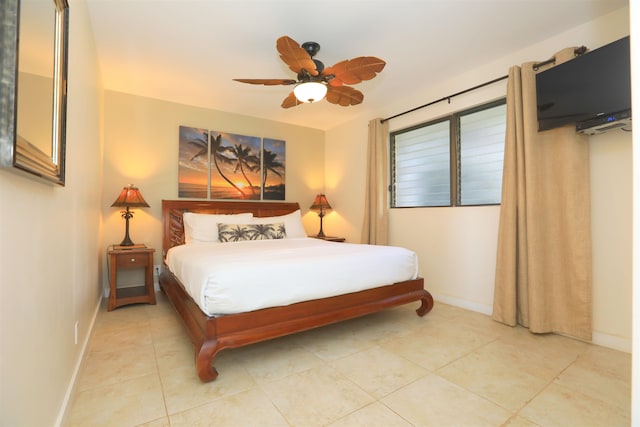 bedroom featuring ceiling fan and light tile patterned floors