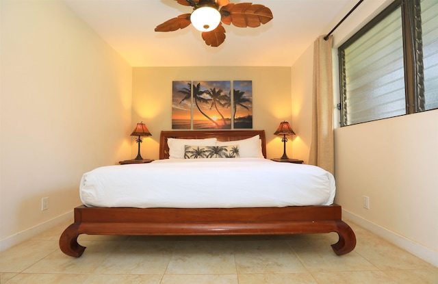 bedroom featuring light tile patterned floors and ceiling fan