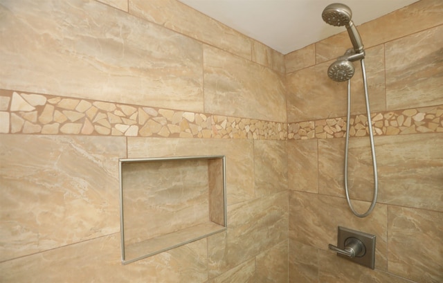 details with a tile shower