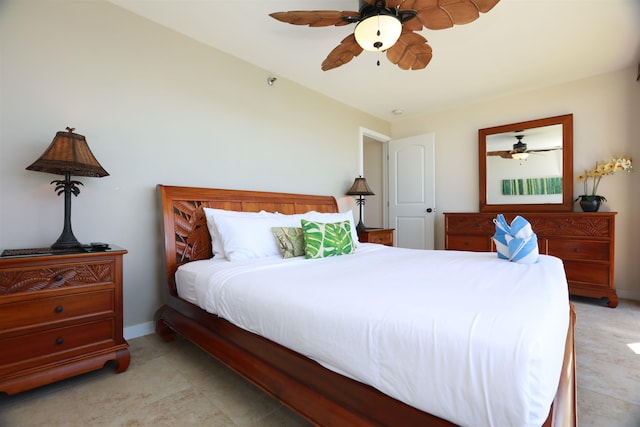 bedroom featuring light tile patterned flooring and ceiling fan