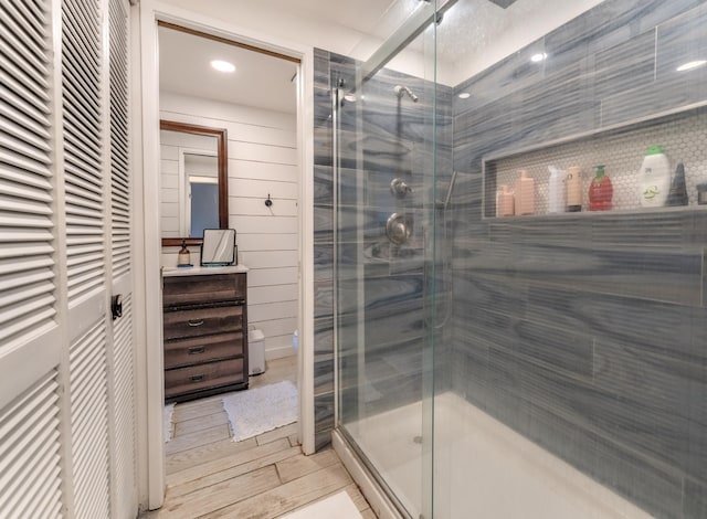1063 Lower Main St Unit 315, Wailuku, HI 96793 - bathroom with a shower stall, vanity, toilet, recessed lighting, and wood finished floors