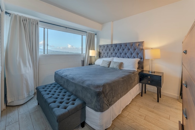 bedroom with light hardwood / wood-style floors