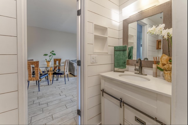 1063 Lower Main St Unit 315, Wailuku, HI 96793 - bathroom with vanity and wood finished floors