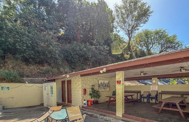 view of patio with ceiling fan