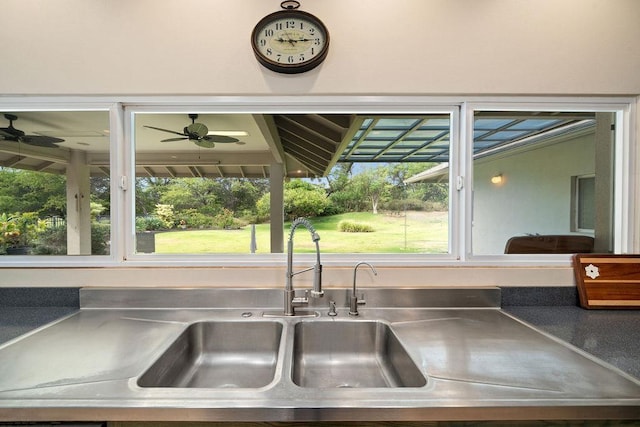 61 Huluhulu Pl, Kahului, HI 96732 - kitchen view of stainless steel counters, a sink, and ceiling fan