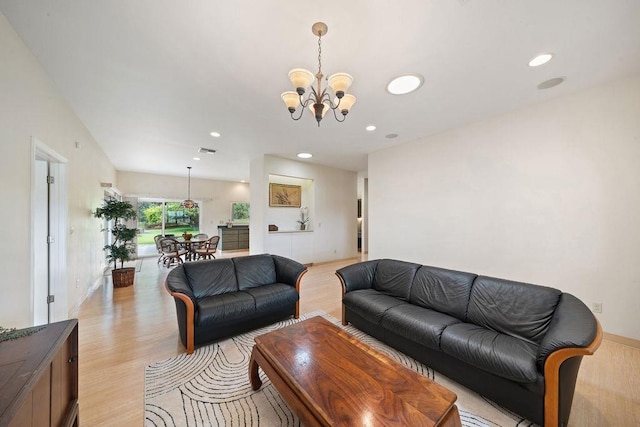 61 Huluhulu Pl, Kahului, HI 96732 - living room with light wood-style flooring, a chandelier, and recessed lighting