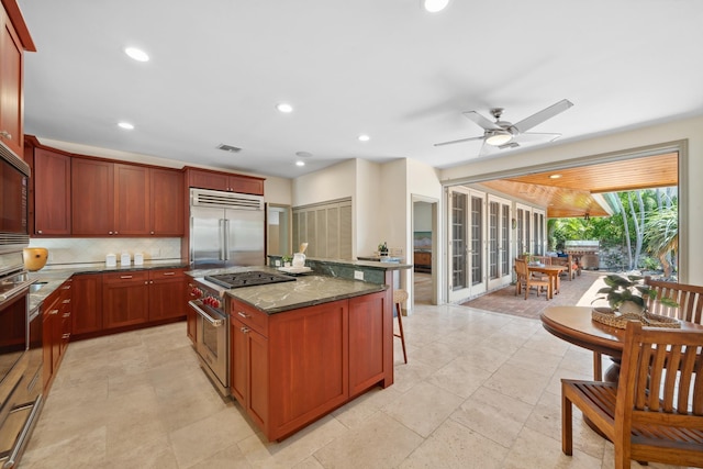 70 Pukolu Way, Kihei, HI 96753 - kitchen featuring high quality appliances, backsplash, a kitchen island, recessed lighting, and a ceiling fan