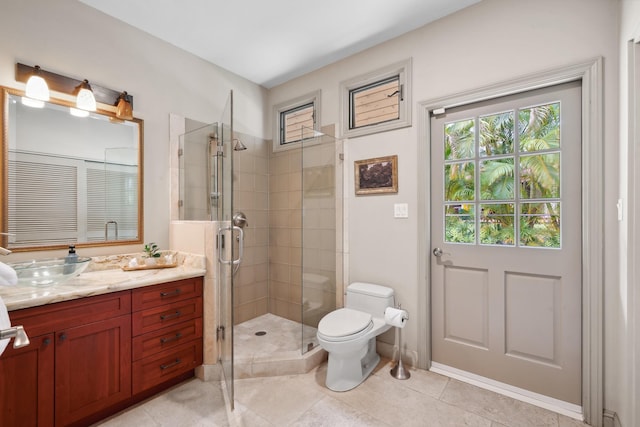 70 Pukolu Way, Kihei, HI 96753 - bathroom featuring a stall shower, vanity, toilet, and tile patterned floors