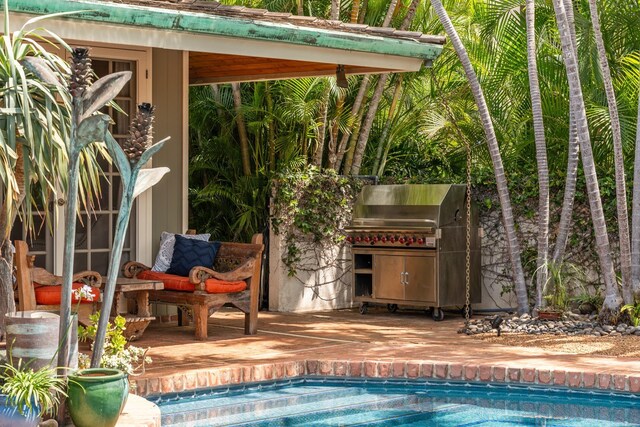 70 Pukolu Way, Kihei, HI 96753 - outdoor pool with a patio and an outdoor kitchen