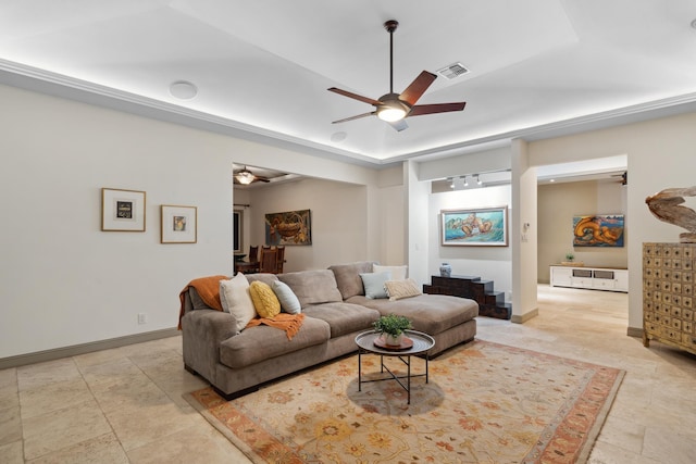 70 Pukolu Way, Kihei, HI 96753 - living room featuring a ceiling fan, baseboards, and light stone finish flooring