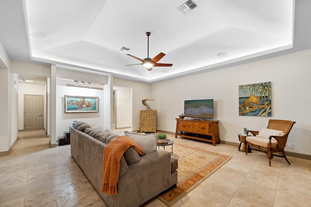70 Pukolu Way, Kihei, HI 96753 - living area featuring a raised ceiling, ceiling fan, and baseboards