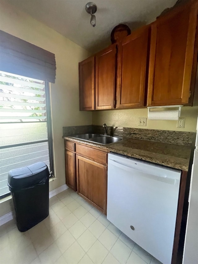 kitchen featuring sink and dishwasher