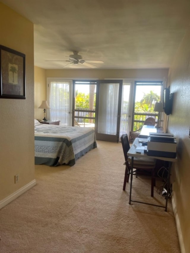 bedroom with ceiling fan, light colored carpet, and access to exterior