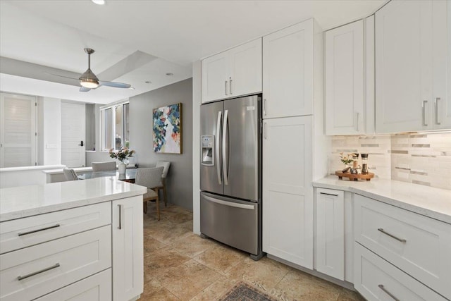 3150 Wailea Alanui Dr Unit 3007, Kihei, HI 96753 - kitchen with stainless steel fridge with ice dispenser, decorative backsplash, white cabinetry, decorative light fixtures, and recessed lighting