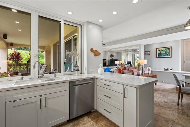 3150 Wailea Alanui Dr Unit 3007, Kihei, HI 96753 - kitchen with dishwasher, recessed lighting, open floor plan, light stone countertops, and a peninsula