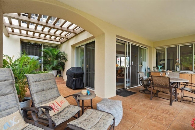 3150 Wailea Alanui Dr Unit 3007, Kihei, HI 96753 - view of patio featuring area for grilling, a pergola, and outdoor dining space