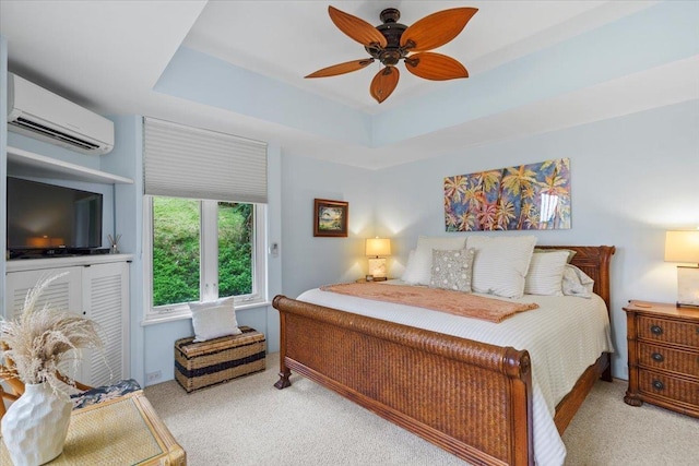 3150 Wailea Alanui Dr Unit 3007, Kihei, HI 96753 - bedroom with a wall unit AC, carpet floors, a raised ceiling, and a ceiling fan