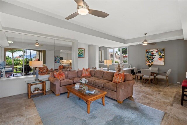 3150 Wailea Alanui Dr Unit 3007, Kihei, HI 96753 - living room with a ceiling fan, healthy amount of natural light, and a raised ceiling
