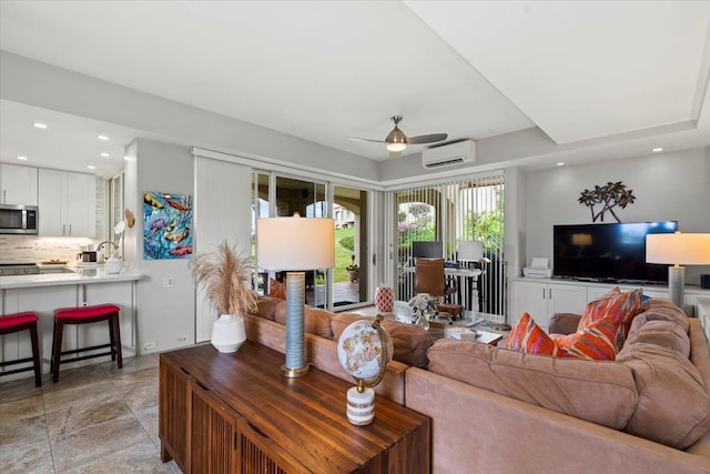 3150 Wailea Alanui Dr Unit 3007, Kihei, HI 96753 - living area with a wall unit AC, ceiling fan, recessed lighting, and light stone finish flooring