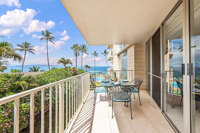 balcony featuring a water view