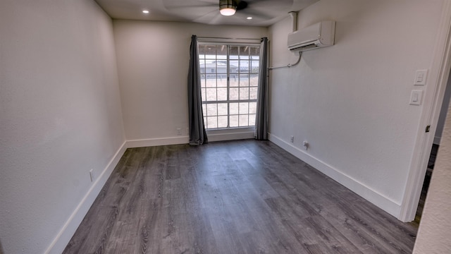 140 Uwapo Rd Unit 2-202, Kihei, HI 96753 - empty room with a wall mounted air conditioner, ceiling fan, and dark wood-style floors