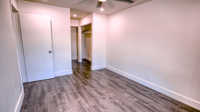 140 Uwapo Rd Unit 2-202, Kihei, HI 96753 - unfurnished bedroom with wood finished floors, recessed lighting, a closet, and a ceiling fan