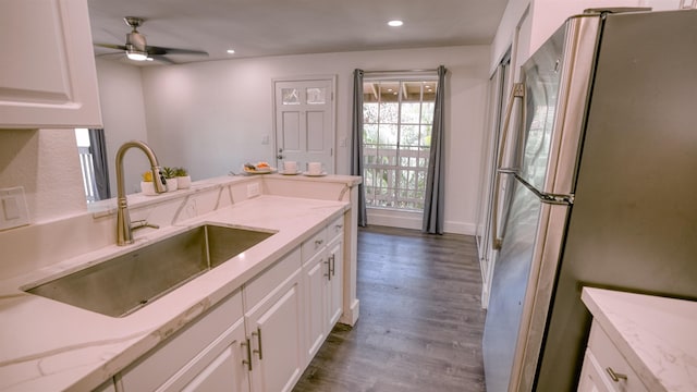 140 Uwapo Rd Unit 2-202, Kihei, HI 96753 - kitchen with freestanding refrigerator, white cabinets, dark wood-type flooring, recessed lighting, and ceiling fan