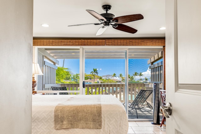 tiled bedroom featuring ceiling fan and access to exterior