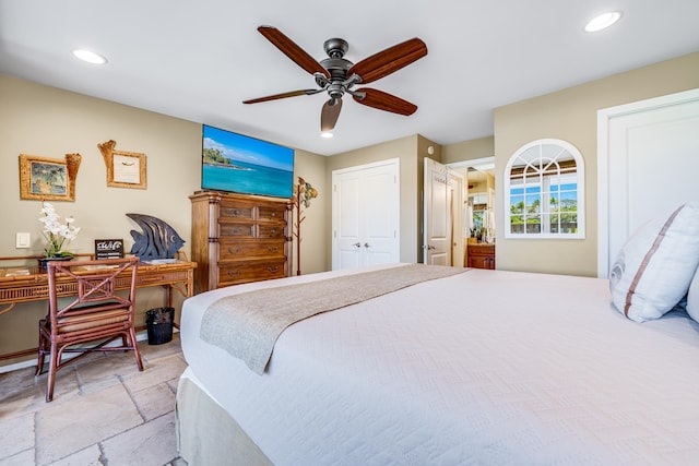 bedroom featuring ceiling fan and light tile flooring