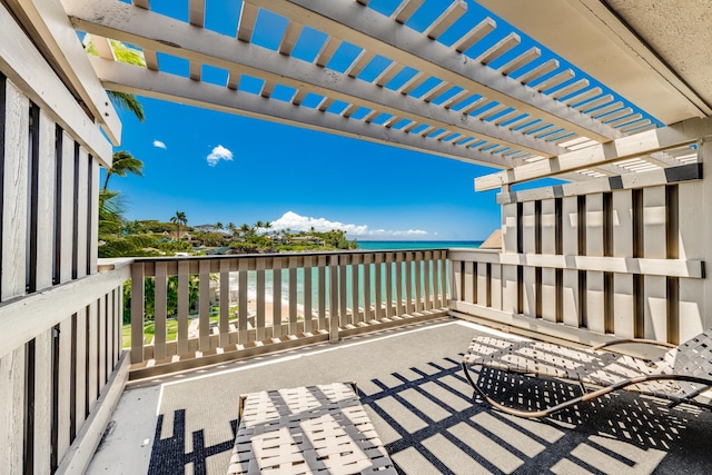 view of patio featuring a balcony and a pergola